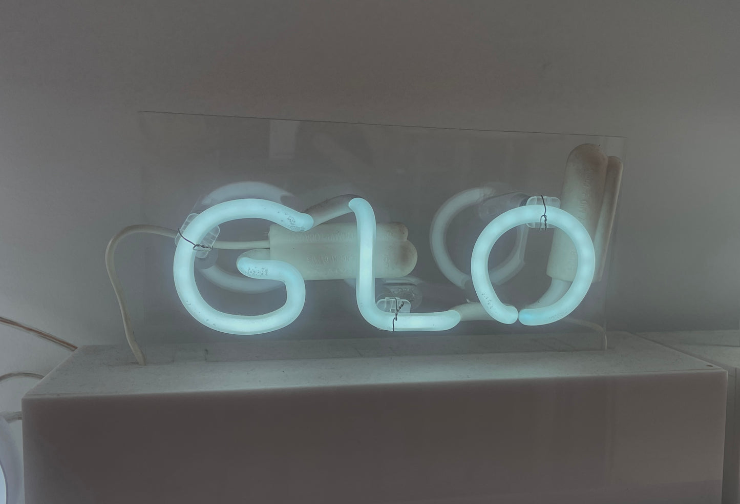 NEON_GLO on wooden box