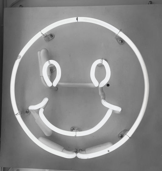 NEON smiley face with backing